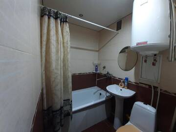 Фото номера Стандартные апартаменты Апартаменты Apartment on Metalurhiv г. Кривой Рог 19