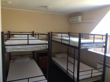 Фото номера Четырехместный номер Хостелы Hostel г. Кривой Рог 3